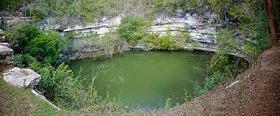 The Cenote de los Sacrificios, the collapsed ceiling of a cave with fresh water filling it in, – Best Places In The World To Retire – International Living